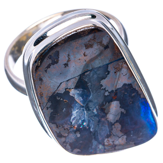 Sterling silver ring with dark blue boulder opal cabochon, bezel set