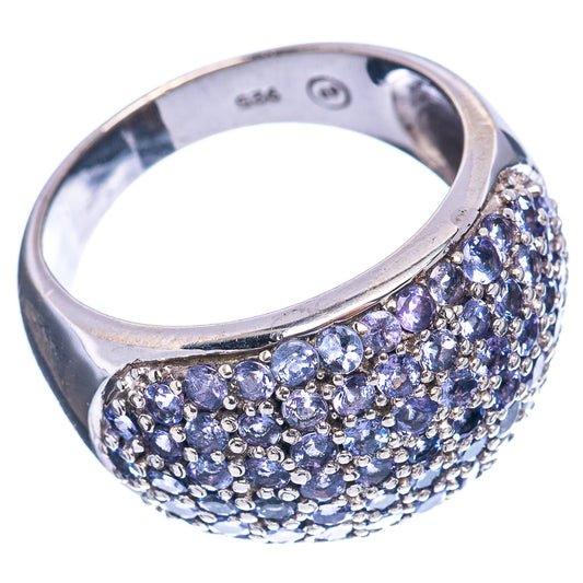 Sterling silver ring with tanzanite-colored stones, curved band, visible 925 hallmark