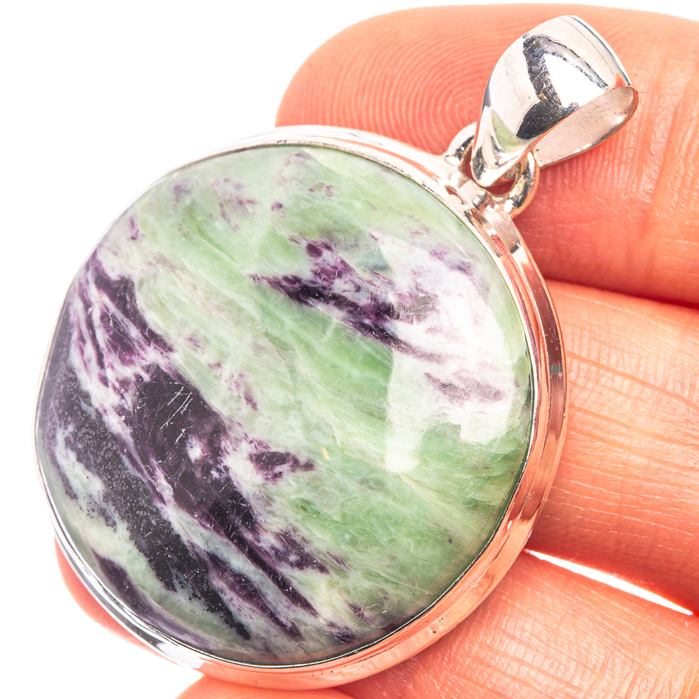 Sterling silver pendant with oval green-purple gemstone and polished bail