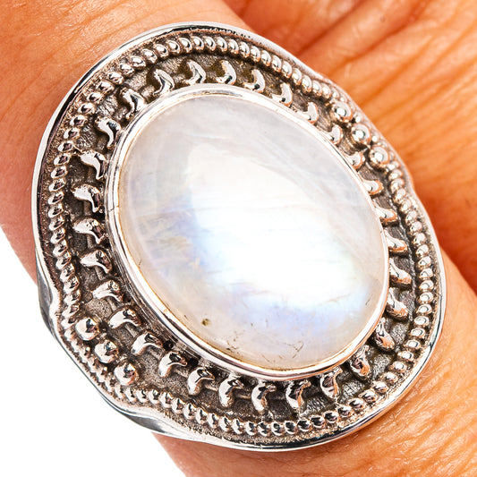 Oval moonstone cabochon ring in .925 sterling silver with ornate beaded bezel