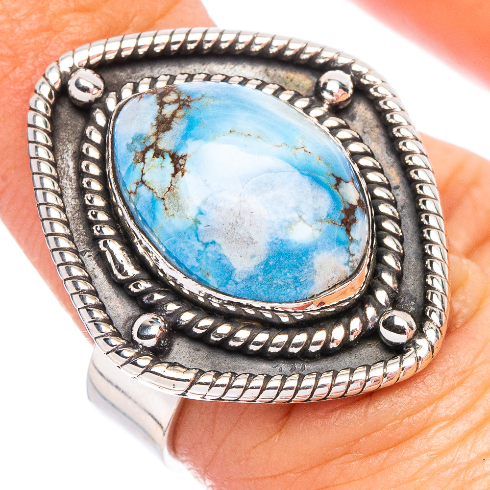 Turquoise oval stone bezel set in dark silver Native-style ring, adjustable band