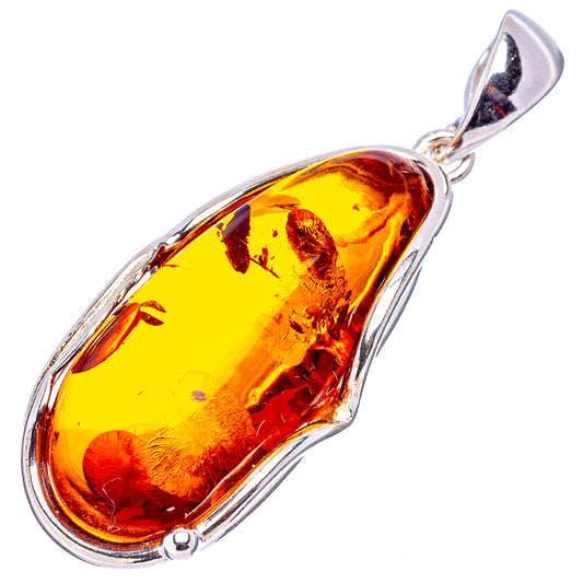 Yellow and red Baltic Amber teardrop pendant in .925 sterling silver setting