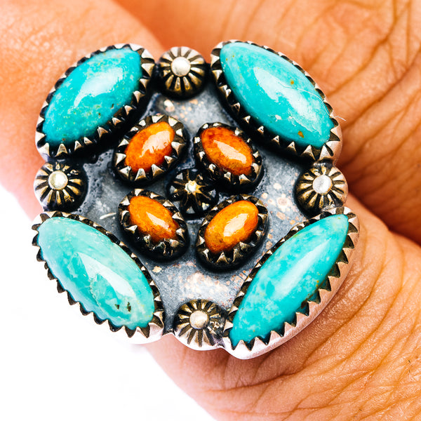 Turquoise and sponge coral cluster ring with dark silver bezel and sunburst accents