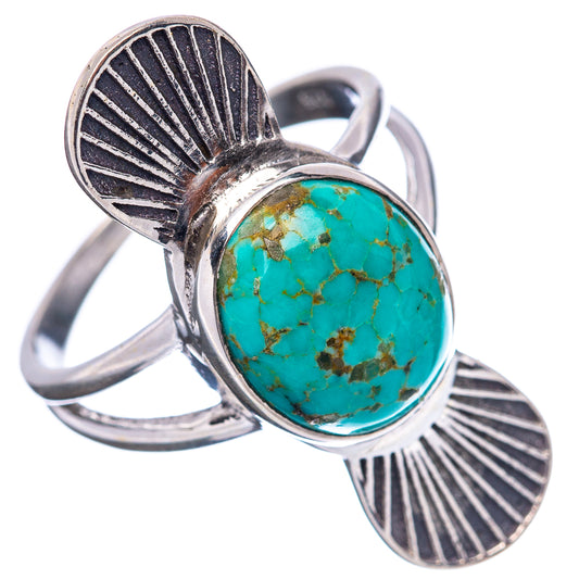 Silver turquoise oval ring with engraved shell motifs on split band and round turquoise stone