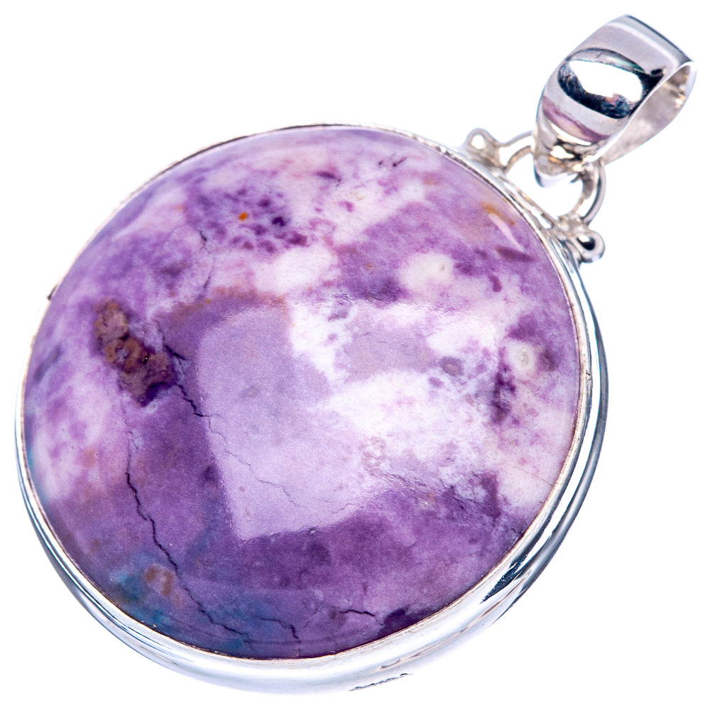 Round purple cabochon Tiffany Stone pendant with sterling silver bezel and clasp loop