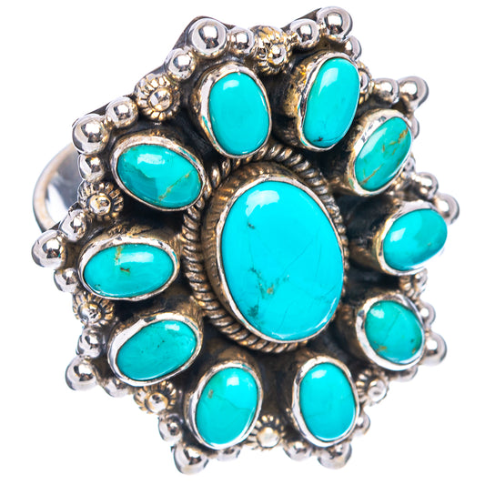 Turquoise cabochon ring with ornate silver bezel and multiple oval stones, top view.