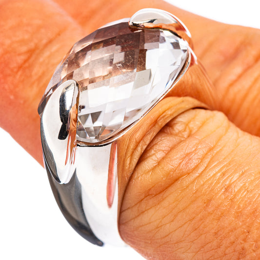 Faceted quartz ring in polished sterling silver, oval stone setting with prongs