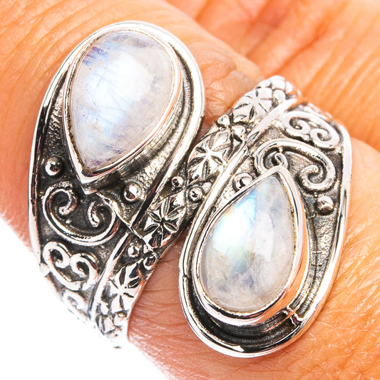 Sterling silver moonstone ring with oval iridescent cabochons and engraved filigree