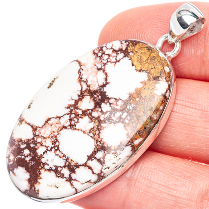 Oval wild horse jasper pendant with silver bail; white and brown web pattern