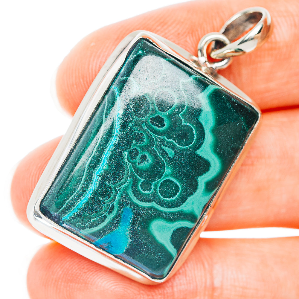 Malachite in chrysocolla pendant, rectangular teal-green stone in German silver frame