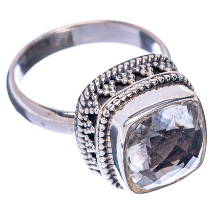 Sterling silver ring with large clear gemstone, side view of beaded shank