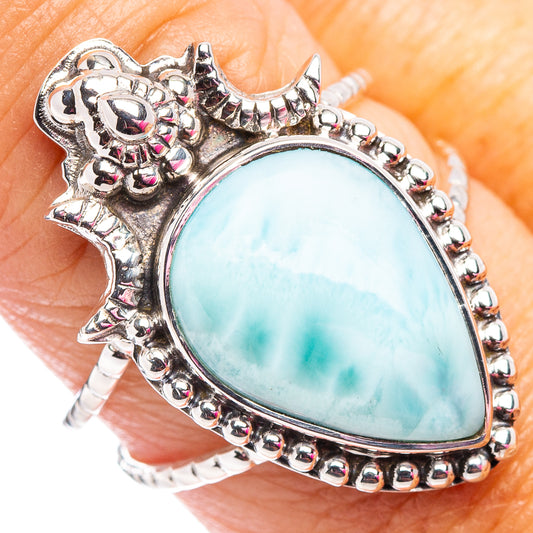 Ornate sterling silver larimar ring with oval light-blue cabochon and bead bezel
