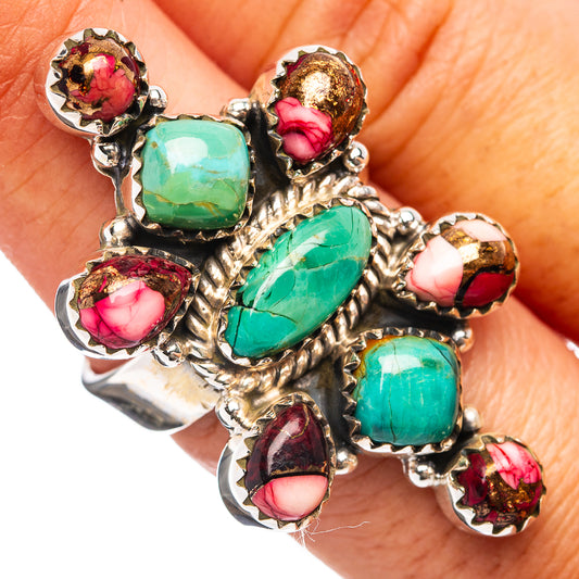 Ornate turquoise and red cabochon ring with six stones and detailed metalwork setting