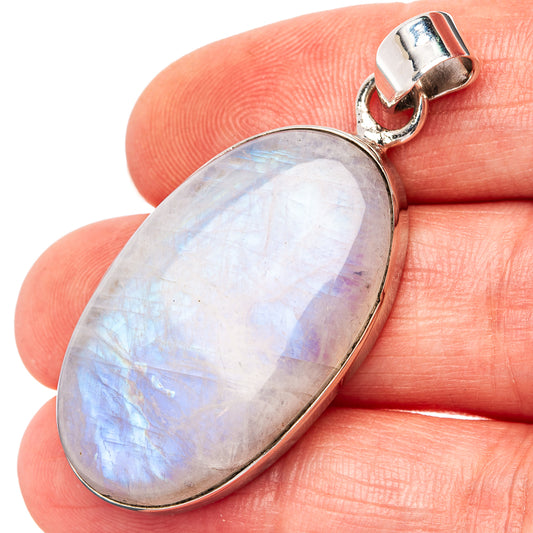 Oval moonstone pendant in .925 sterling silver bezel with bail, iridescent light blue