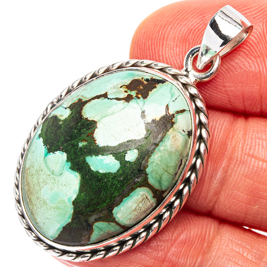 Turquoise oval pendant with rope-edge .925 sterling silver bezel and bail