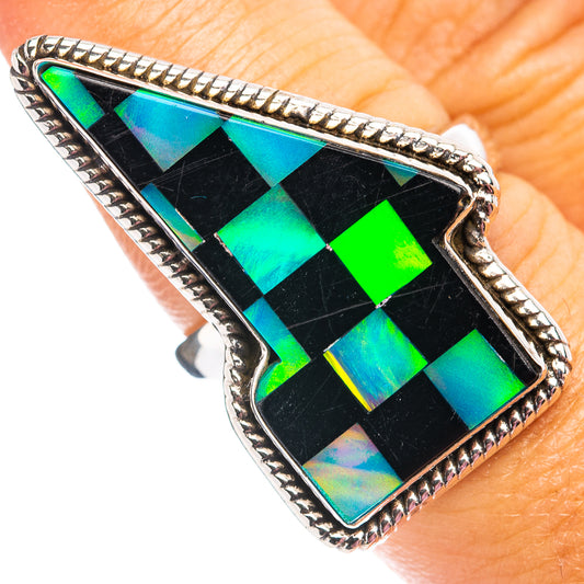 Sterling silver opal ring with geometric lightning-bolt mosaic, black base with blue-green flashes