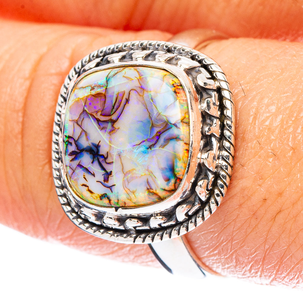 Oval opal stone sterling silver ring with ornate bezel, multicolor iridescent pattern