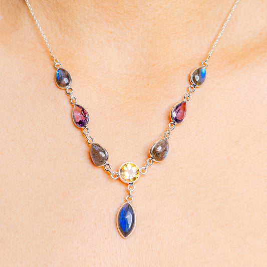 925 sterling silver necklace with oval blue, red, and yellow gemstone drops