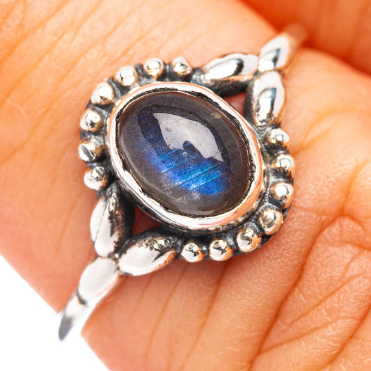 Sterling silver oval labradorite ring with beaded halo and blue flash stone