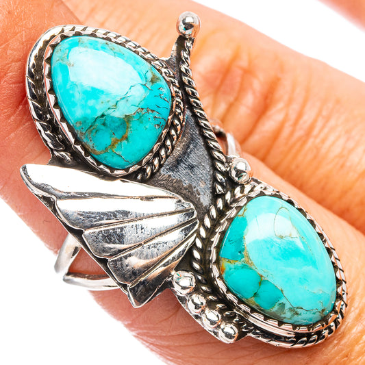 Sterling silver turquoise ring with two oval stones, braided rope bezel and leaf-like details