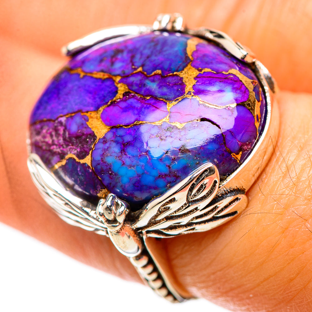 Oval purple turquoise cabochon ring with gold veining, ornate sterling silver setting