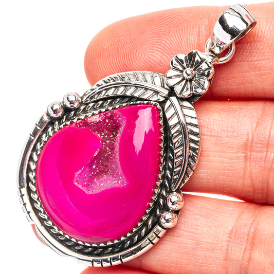 Pink druzy agate teardrop pendant in .925 sterling silver bezel with ornate frame