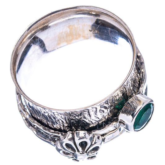 Sterling silver ring with oval green emerald on side, ornate engraved band, size 9.75
