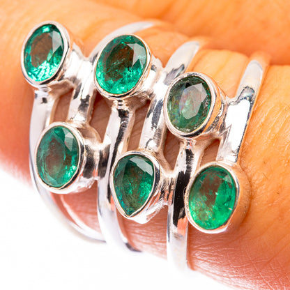 Sterling silver ring with six oval green emerald cabochon stones