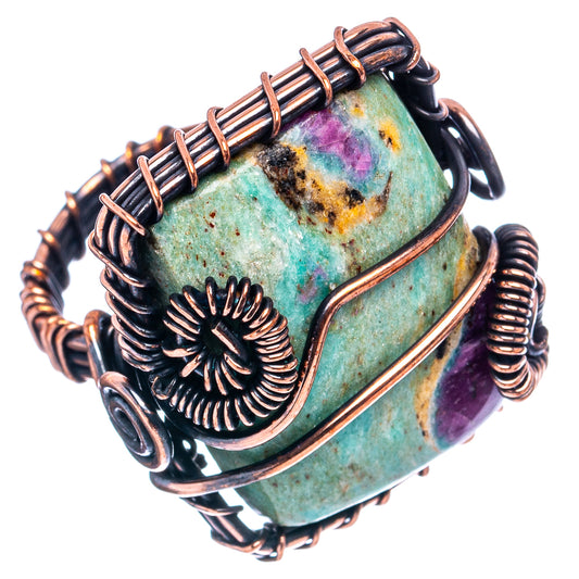 Oxidized copper wire wrap ring, turquoise green cabochon with purple highlights