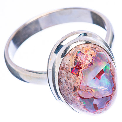 Sterling silver fire opal ring with oval multicolor stone, open-band view