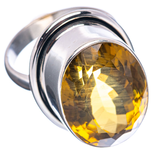 Sterling silver ring with oval faceted amber quartz, side angle showing band