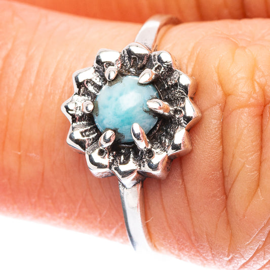 Sterling silver larimar ring with round light-blue gemstone in floral prong setting