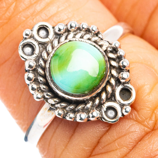 Dainty .925 sterling silver ring with green turquoise cabochon and halo beadwork