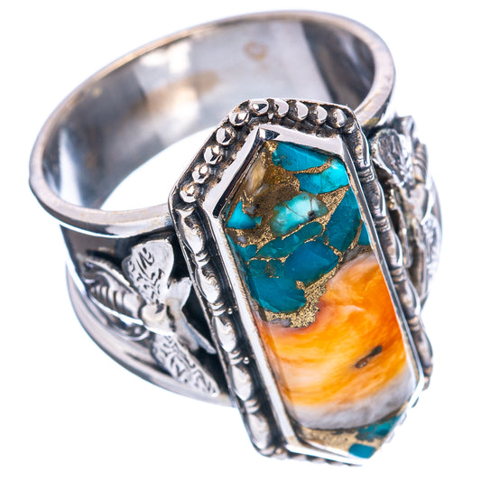 Turquoise spiny oyster ring with oval cabochon and engraved .925 sterling silver band.
