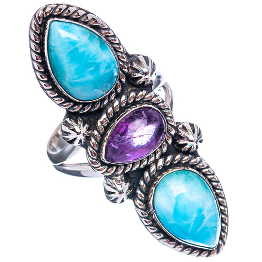Sterling silver ring with three oval gemstones: blue larimar and purple amethyst