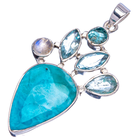 Sterling silver gemstone pendant with large turquoise teardrop and mixed blue oval stones