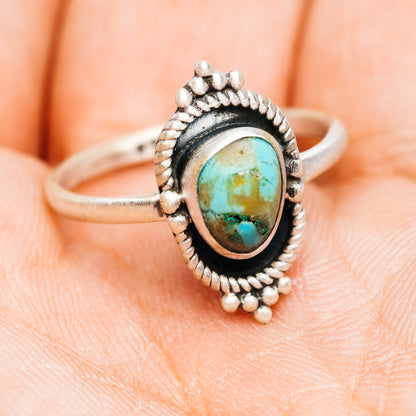 Oval turquoise cabochon sterling silver ring, beaded border and split shank, size 8