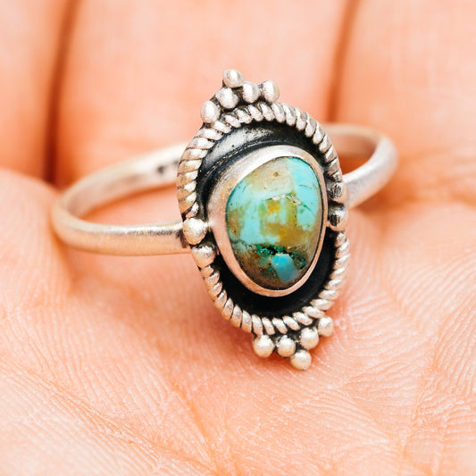 Oval turquoise cabochon sterling silver ring, beaded border and split shank, size 8