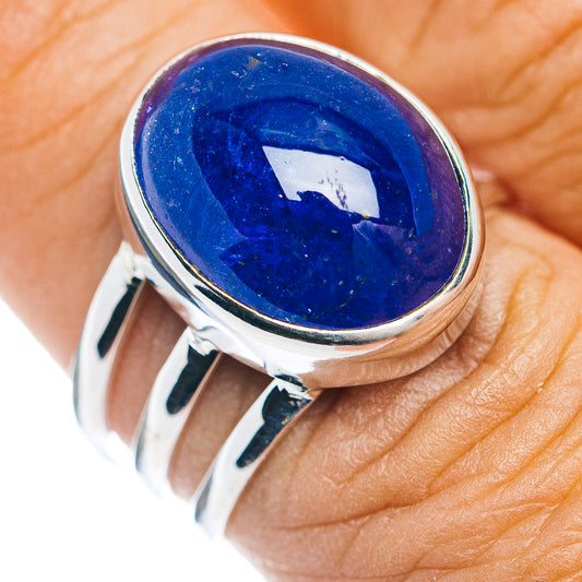 Sterling silver ring with large oval blue gemstone bezel