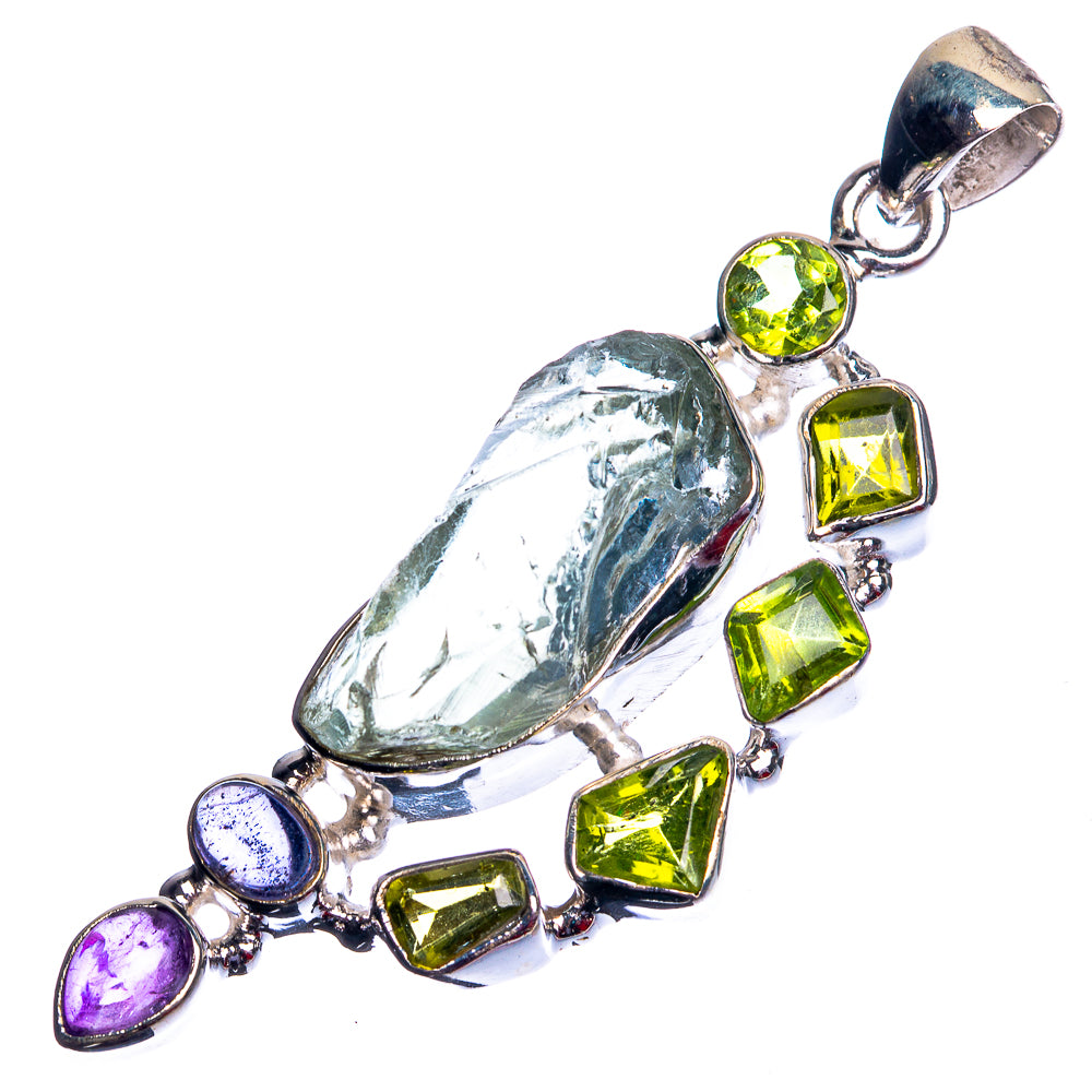 Sterling silver pendant with rough aquamarine, green peridot, purple amethyst side stones