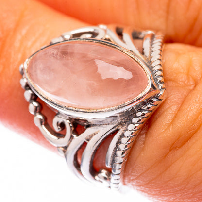 Rose quartz oval sterling silver ring with ornate bezel and beadwork details