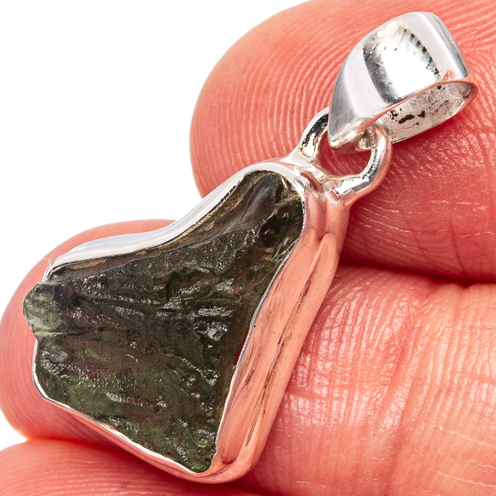 Sterling silver pendant with dark green rough Moldavite stone in open bezel