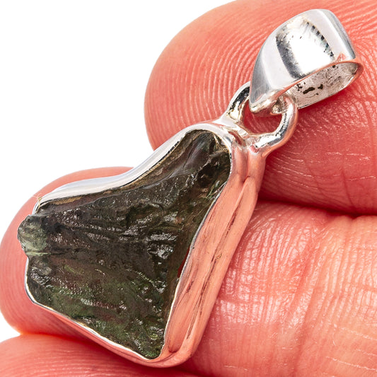 Sterling silver pendant with dark green rough Moldavite stone in open bezel