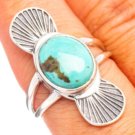 Silver turquoise ring with oval Mojave-style stone and leaf-like metal rays