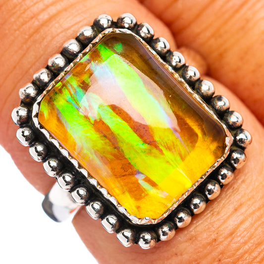 Ethiopian opal ring in .925 sterling silver, yellow-green oval gem with beaded border