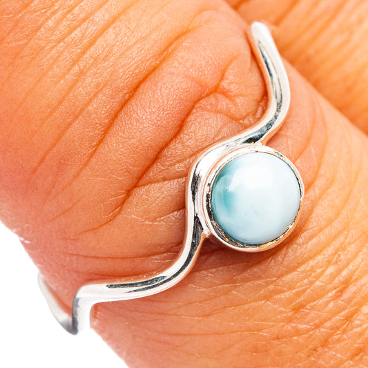 Sterling silver ring with oval blue larimar stone, curved band detail