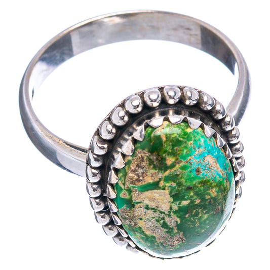 Oval green turquoise cabochon ring, silver band with beaded edges and halo bezel