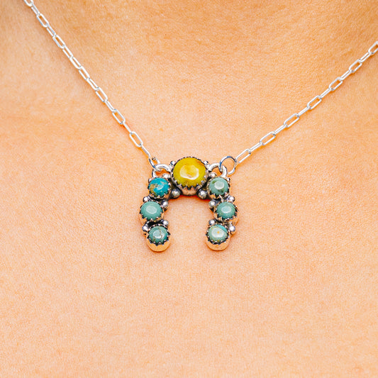 Turquoise and yellow stone pendant necklace with silver chain and round bezel settings