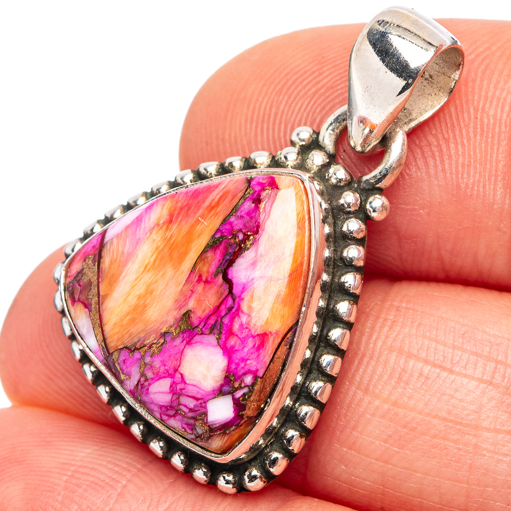 Sterling silver gemstone pendant with pink-purple teardrop stone and beaded border