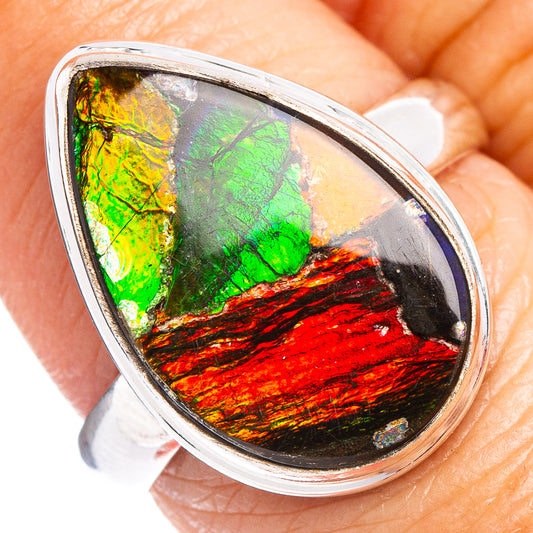 Sterling silver ammolite ring with teardrop iridescent green and red stone